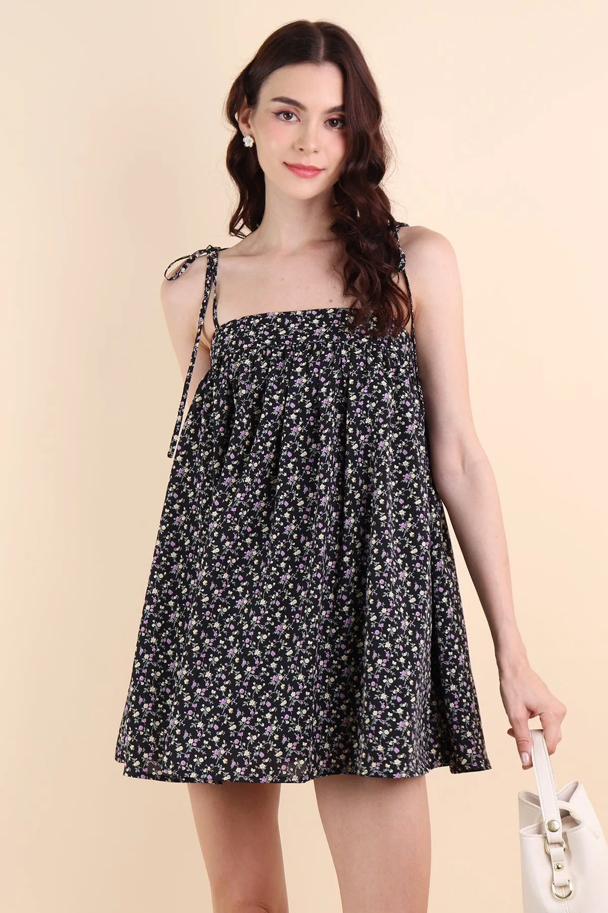 ODETTE FLORAL TRAPEZE ROMPER DRESS IN BLACK