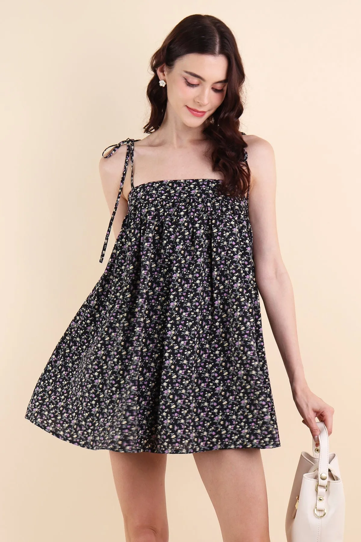 ODETTE FLORAL TRAPEZE ROMPER DRESS IN BLACK
