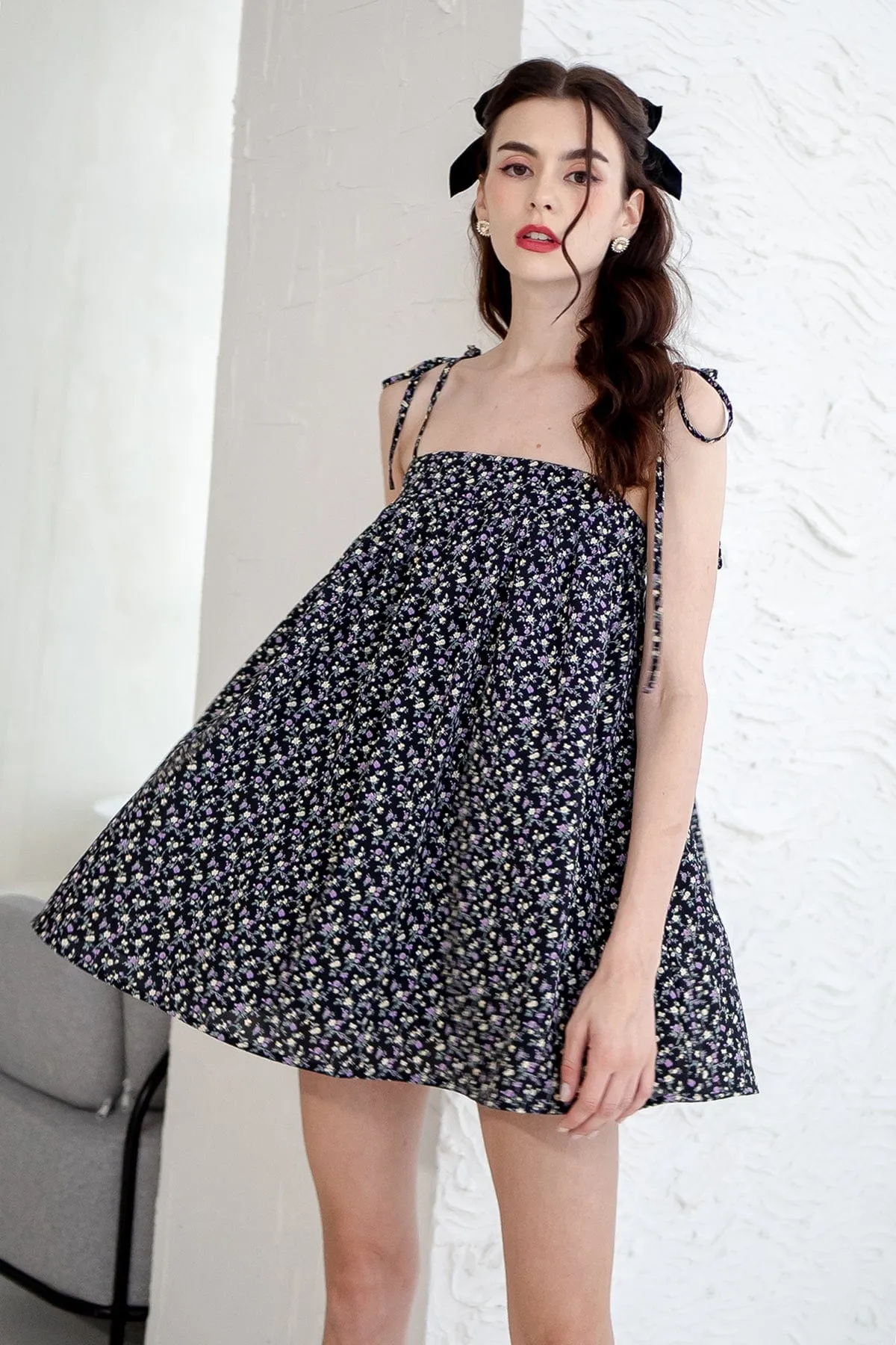 ODETTE FLORAL TRAPEZE ROMPER DRESS IN BLACK