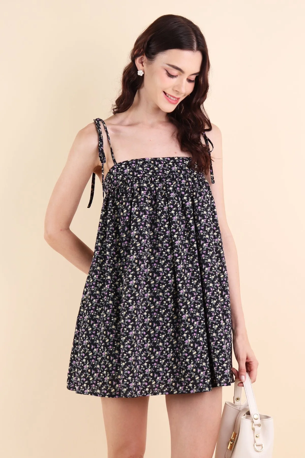 ODETTE FLORAL TRAPEZE ROMPER DRESS IN BLACK